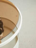 Tempered Glass Oval Coffee Table with Vented Metal Storage and Swivel Wheels - Brown and White - Image 11