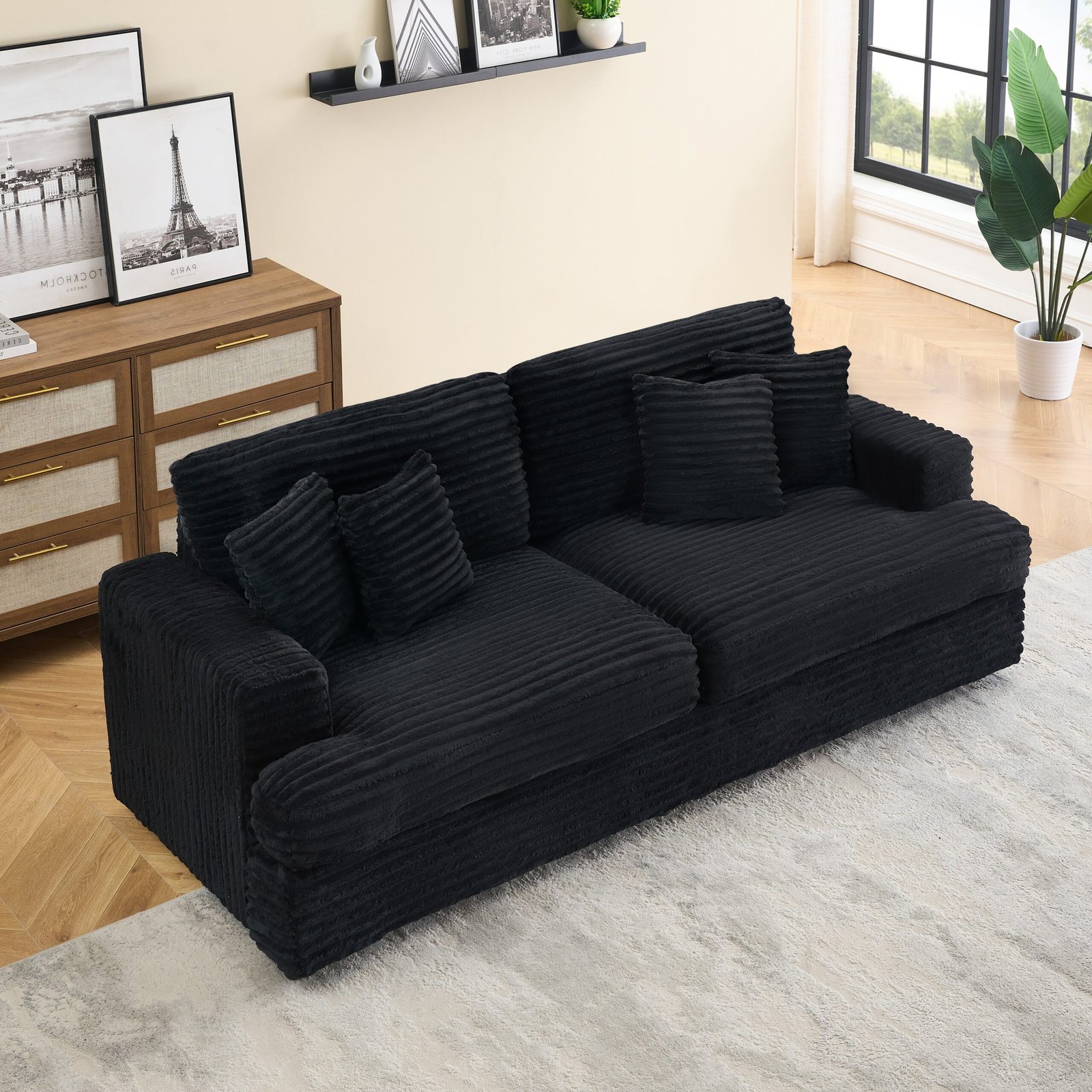 88.58" corduroy 3-seater sofa, spacious and comfortable. Paired with 4 throw pillows in the same color, it adds an elegant touch to a modern living room.Black