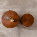 Handcrafted Wood Round Coffee Table with Elegant Relief Design - Natural Finish - Image 5